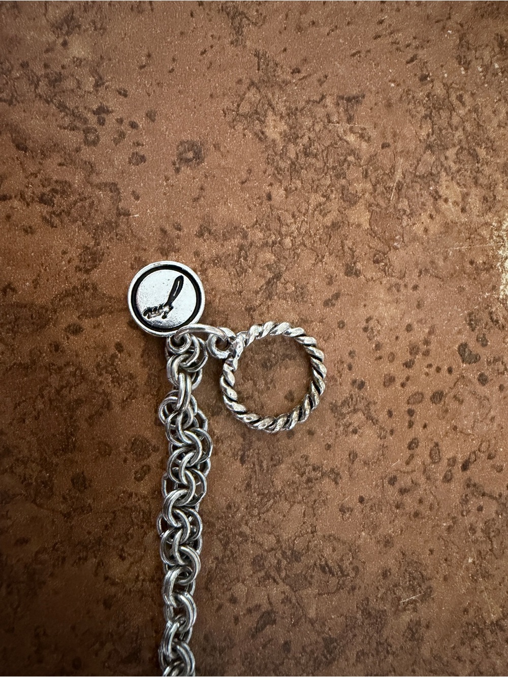 Brighton Silver Tone Charm Bracelet with Twisted Ring Accent